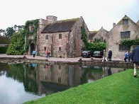 image: Looking across fishpond towards Cothay Manor gatehouse